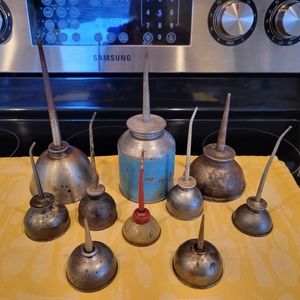 Vintage 10 oil cans
